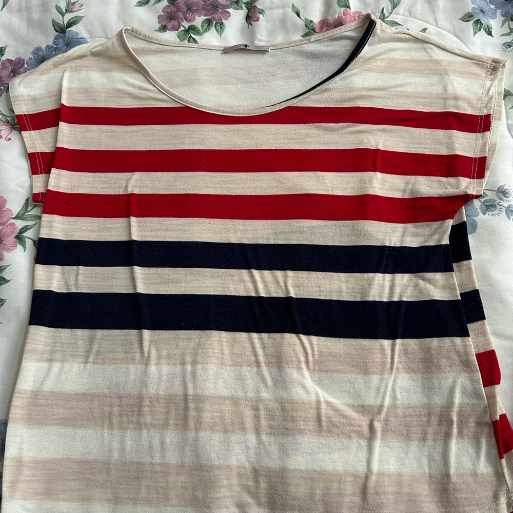 In good condition red/Blue Blouse. Used a few times and normal wear.